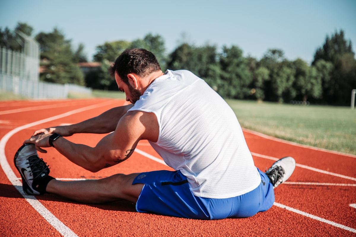 Man performing yoga flexibility pose